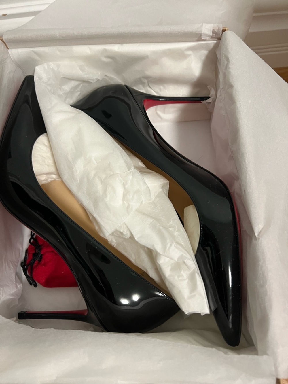 Christian Louboutin Black Patent Pointed-Toe Heels with Red Sole